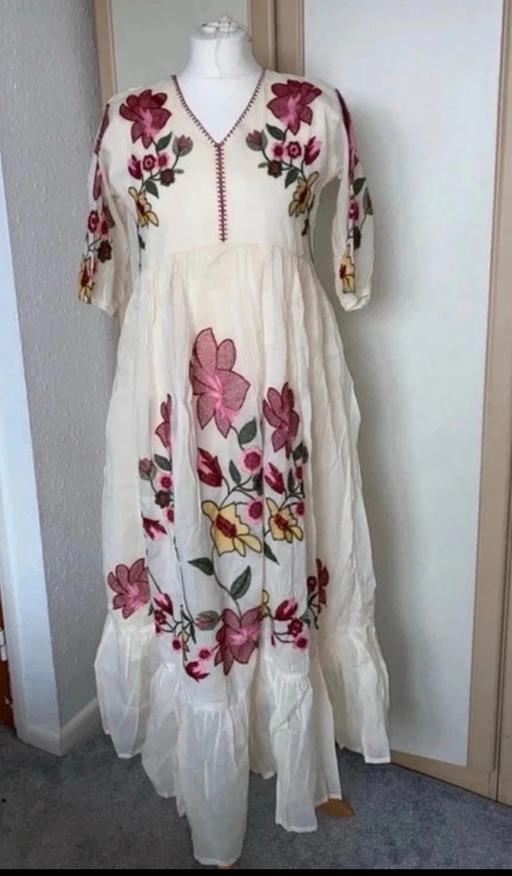  — Dress