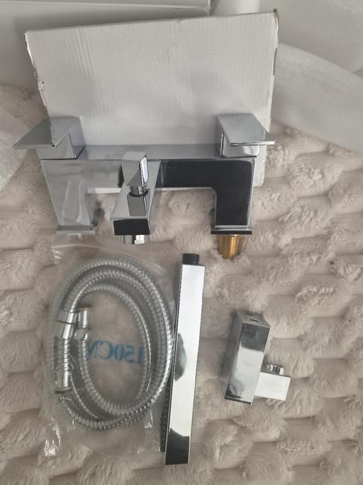  — Bath tap mixer and shower hose