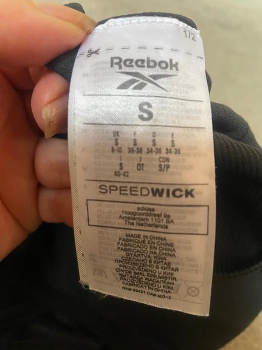  — Reebok sports top size 8