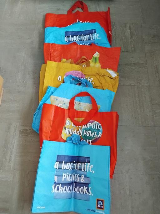  — 7 Shopping Bags.