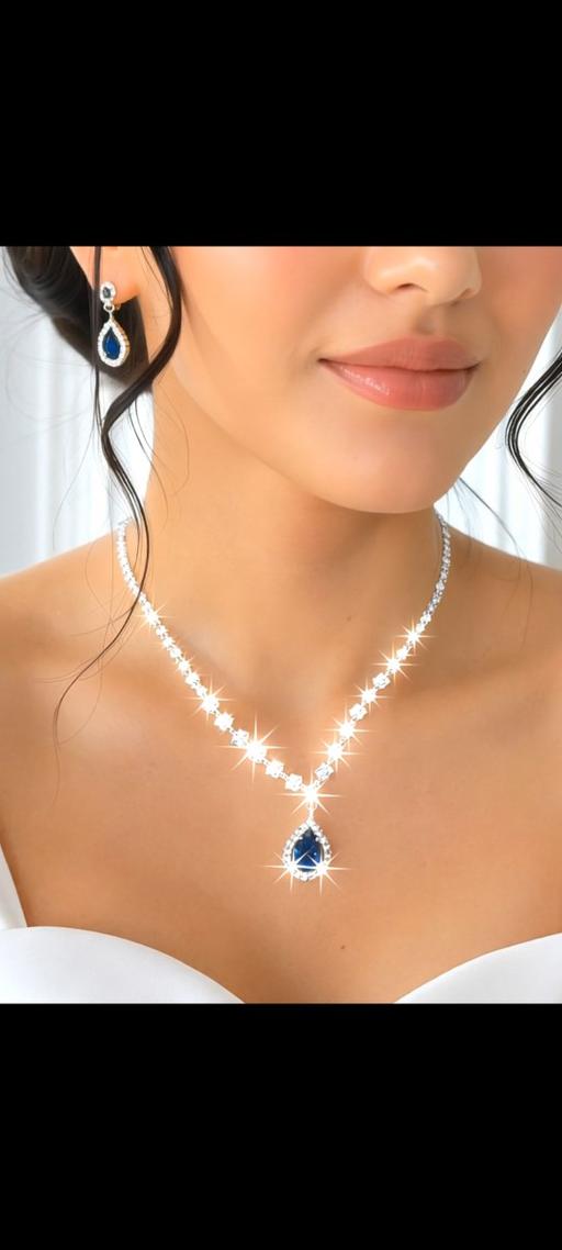  — women's sapphire teardrop