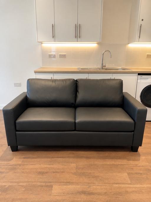  — Brand New Black Faux Leather Sofa