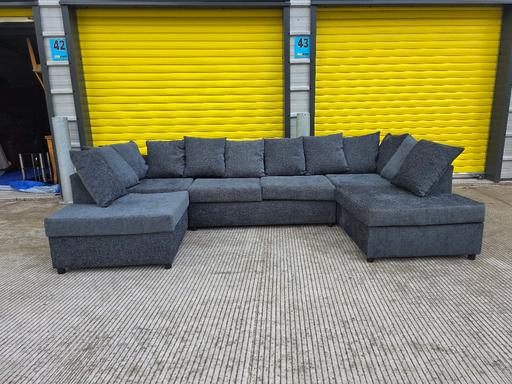  — large grey fabric U shape sofa
