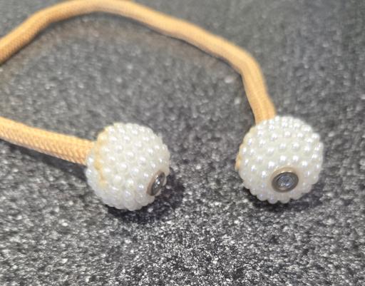  — SHOWER CURTAIN TIE