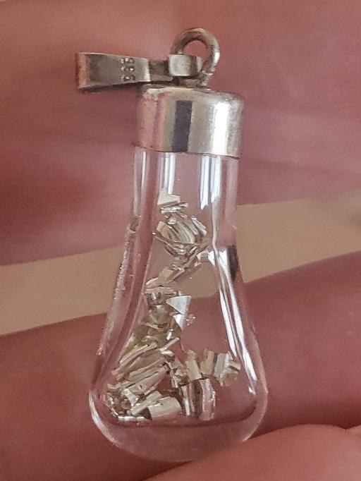  — unusual sterling silver bottle pendant