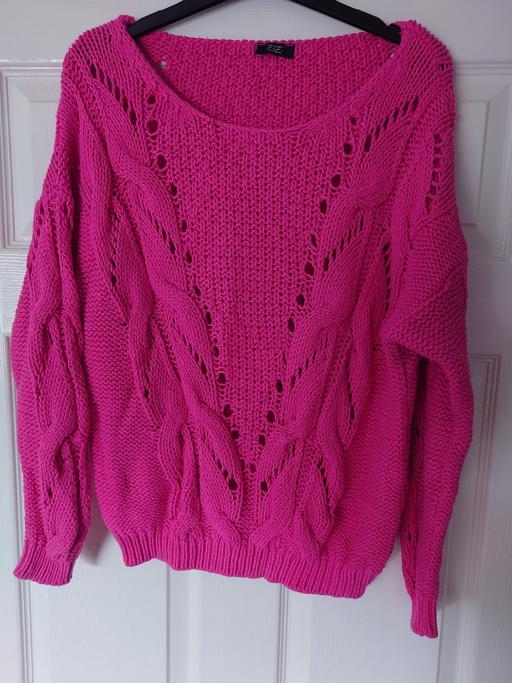  — Women's pink jumper size 16