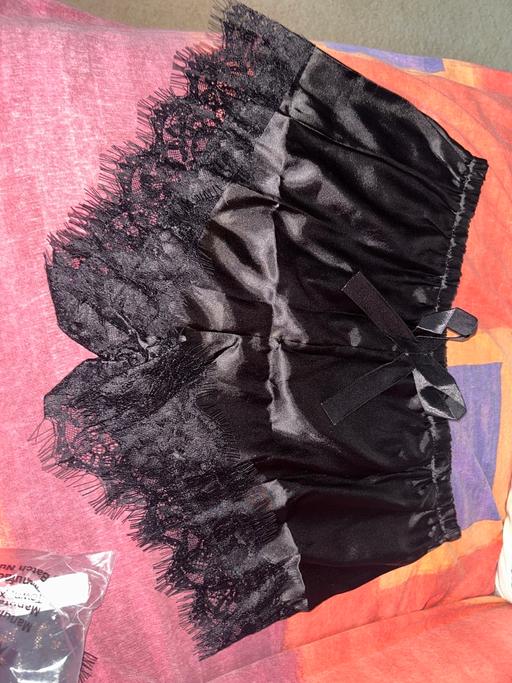  — Ladies Black Silky Shorts size L .more like S
