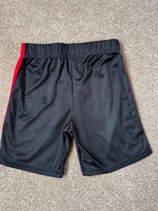  — Boys black shorts 6-7 years