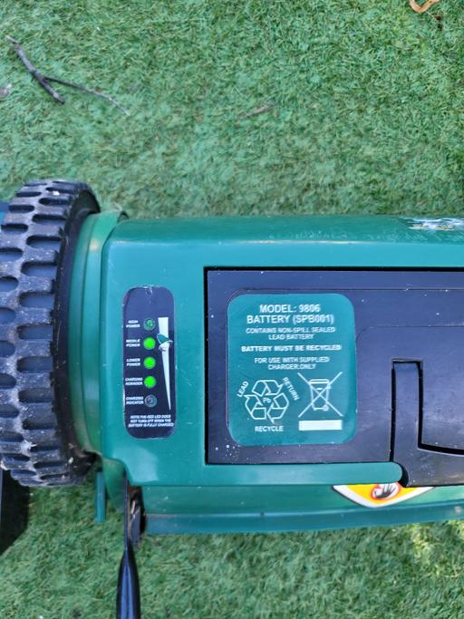  — cordless lawnmower with battries and charger