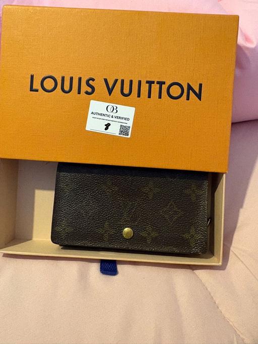  — LV monogram brown leather purse.