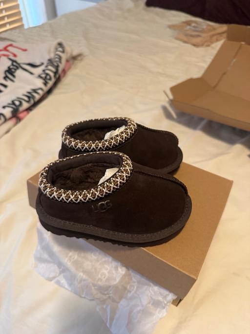  — Tasman Ugg