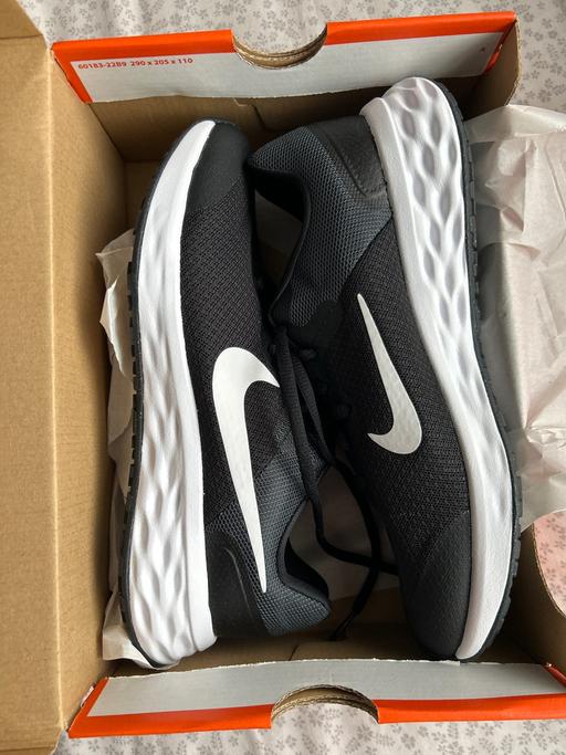 — Nike revolution