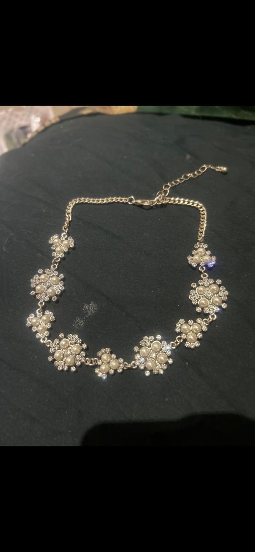  — Pearl necklace