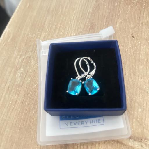  — Brand new 925 silver and blue topaz earrings