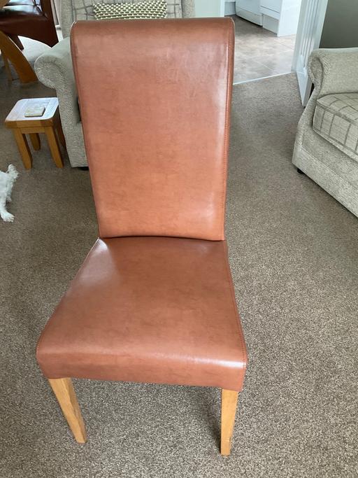  — 2 Tan dinning chairs