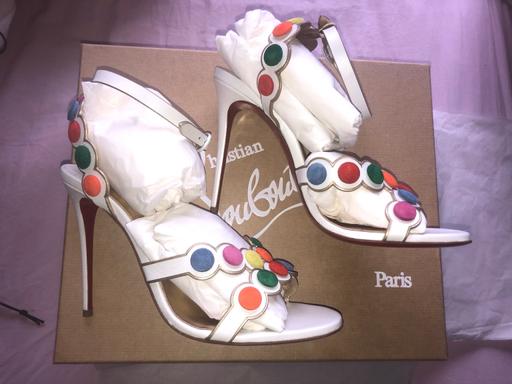  — Christian Louboutins heels