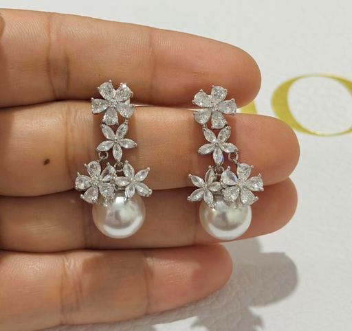  — Pearl earrings