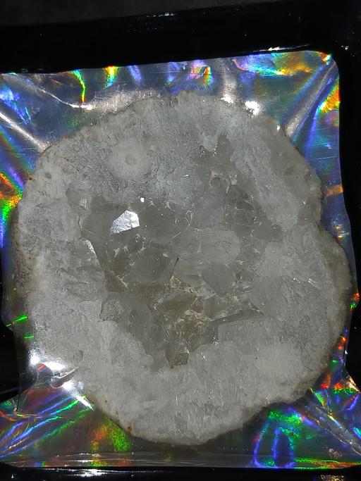  — A rough-rock crystal.