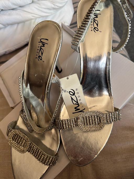  — Heels