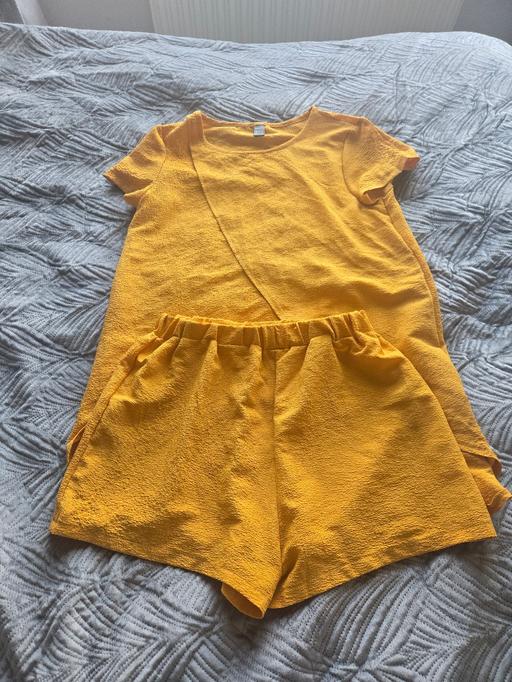  — womens shorts and top set size 10