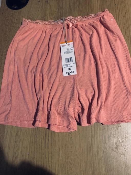  — Pink shorts