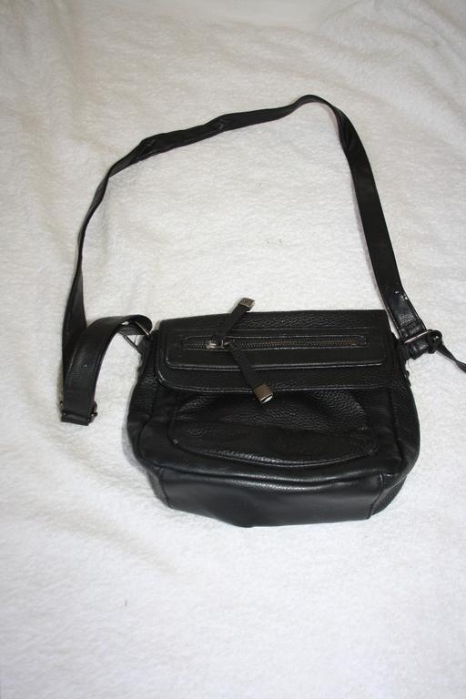  — black leather bag