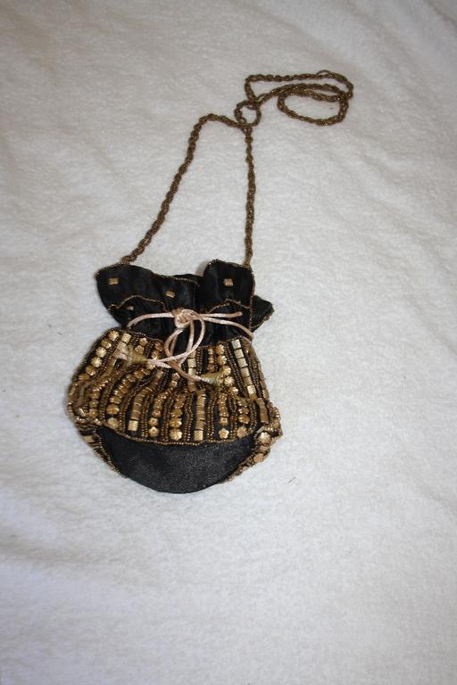  — Coin over the shoulder bag