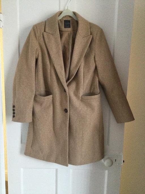  — Ladies coat size 10