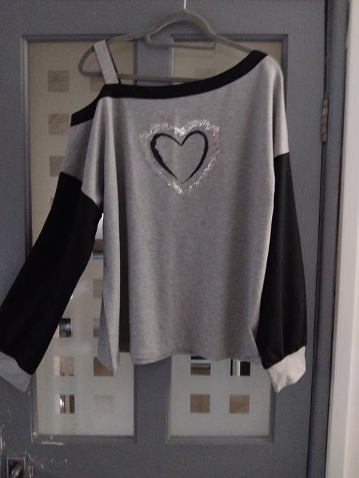  — ladies top