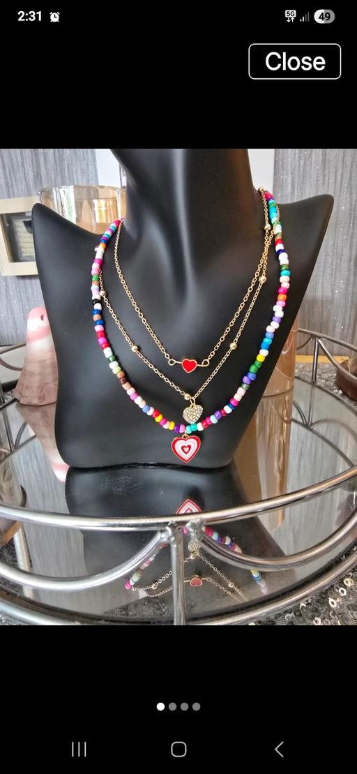  — Three necklaces