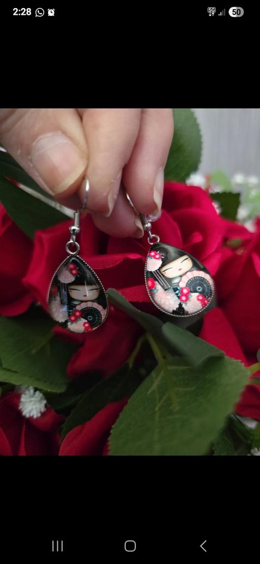  — Earrings