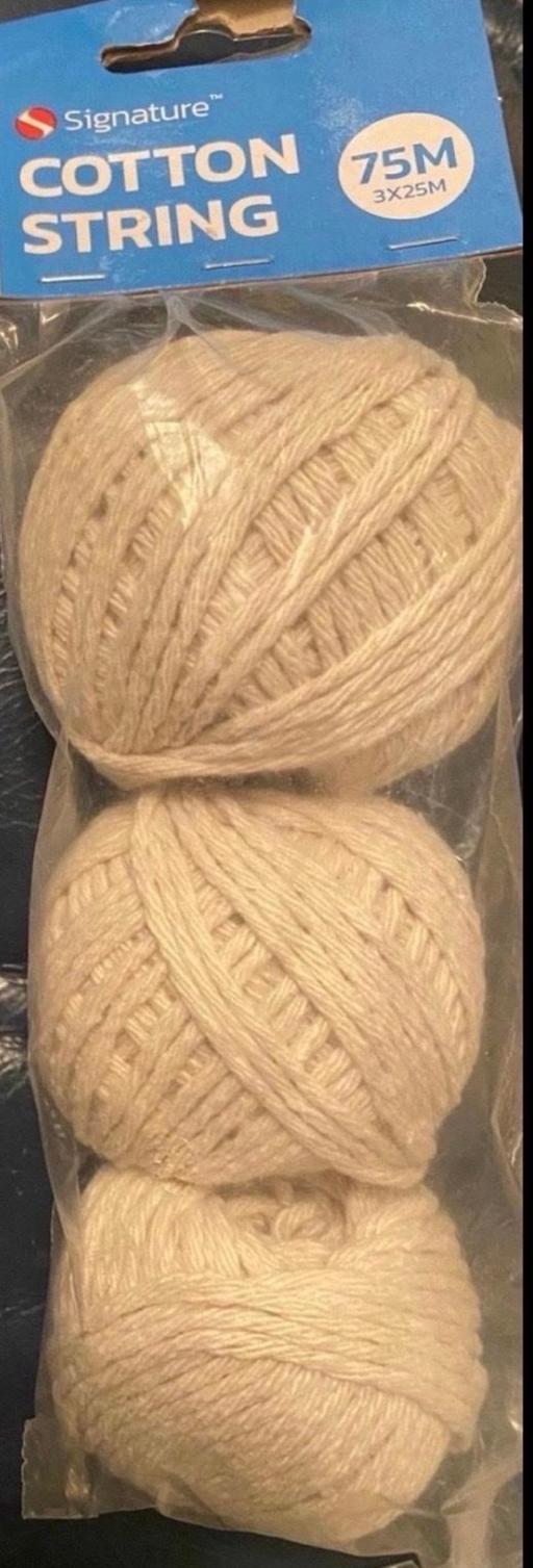 — Rolls of string