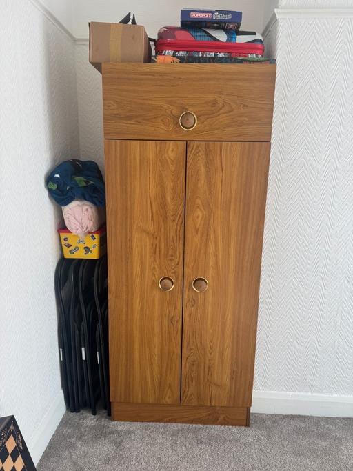  — Wardrobe