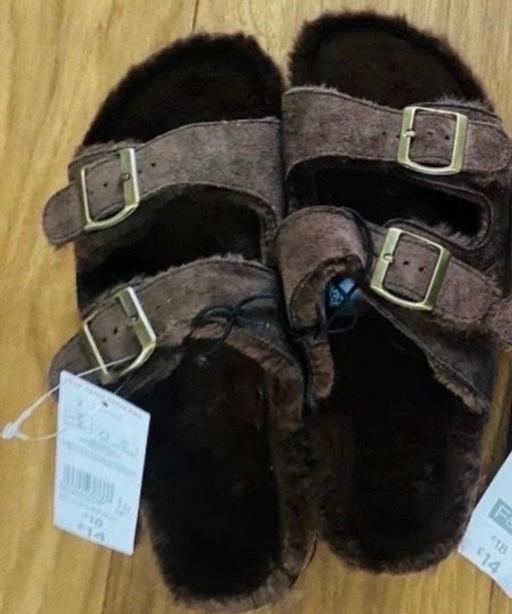  — Men’s fur lined mules size 9