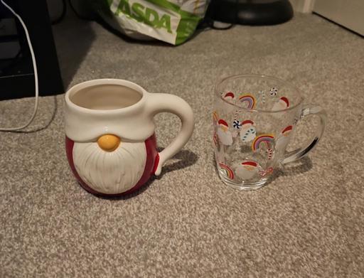  — 2x Christmas cups/ mugs