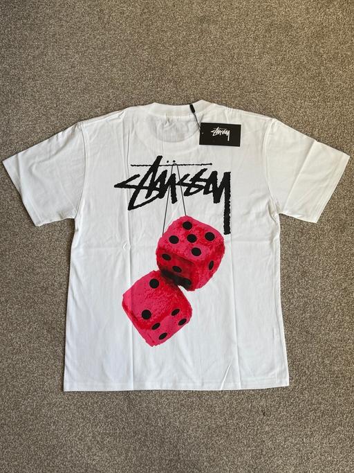 — Stüssy Pink Fuzzy dice T-shirt.
