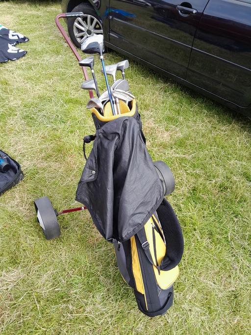  — golf clubs and bag/trolley