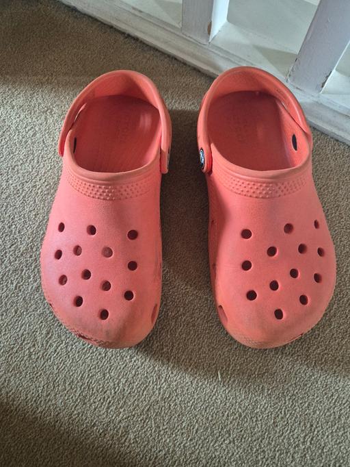  — Children's orange crocs