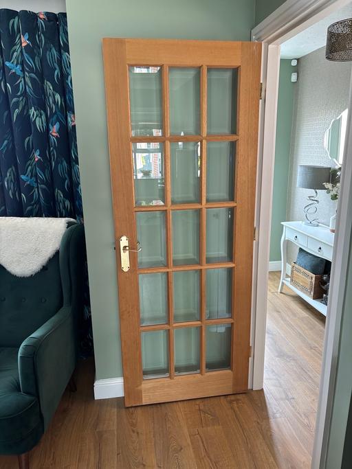  — Hardwood glass panel door