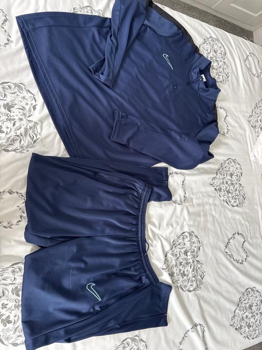  — Tracksuit