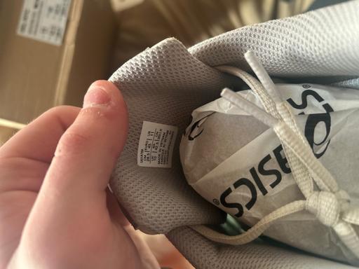  — ASICS