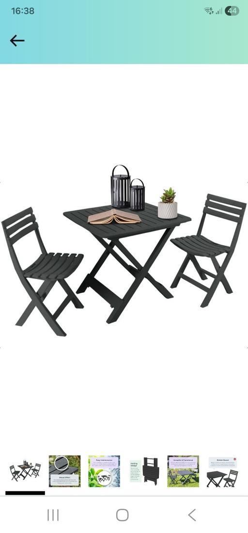  — black table and 2 chairs