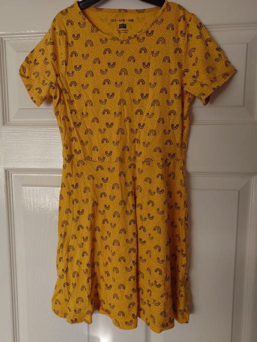  — Girls yellow dress size 10-11 years