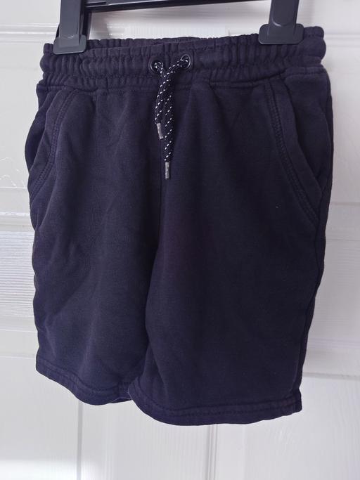  — Boys black shorts size 6-7 years