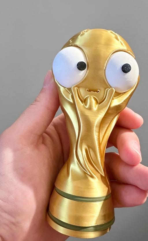  — Funny golden World Cup style with movable eye