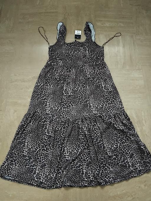  — New Dress 12.
