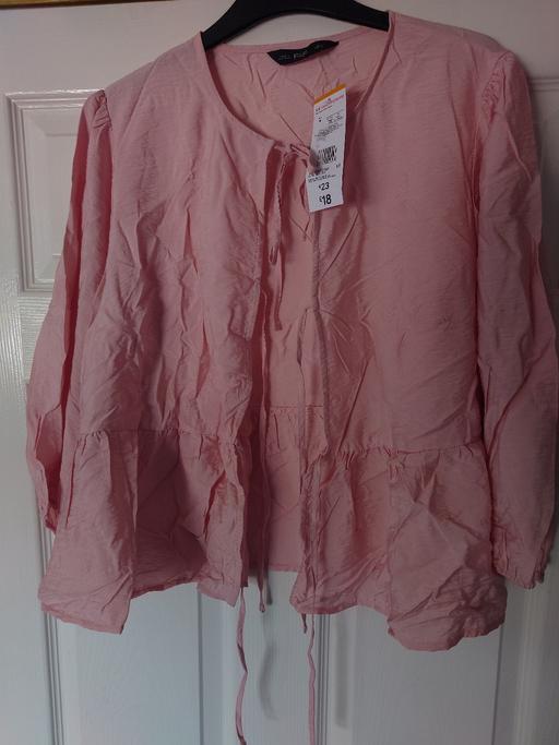  — Women's pink blouse size 16