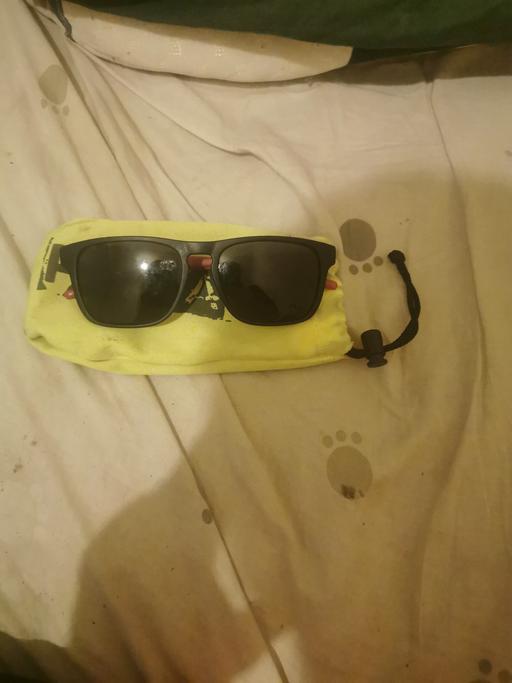 — puma sunglasses with cleaner and holder