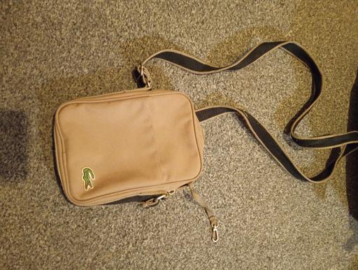  — beige Lacoste man bag
