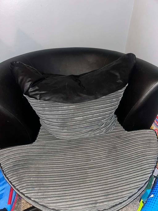  — Grey and black swivel chair
